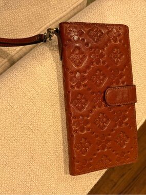 Patricia Nash Embossed Floral Leather Wristlet in Cognac